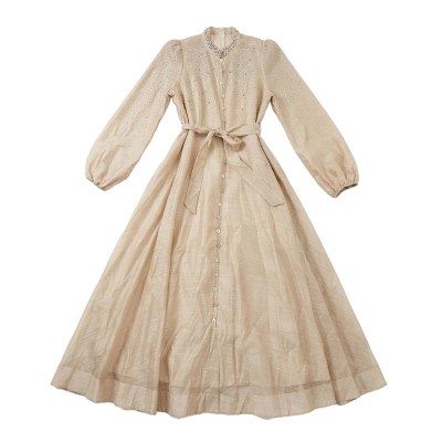Robe Stella longue perlée à col brillant et coupe fluide