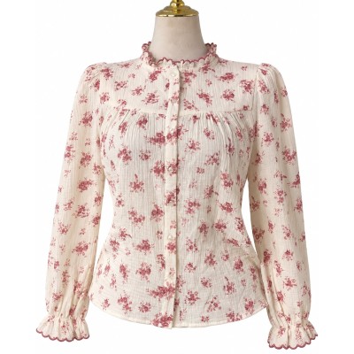 Chemise femme fleurie à manches longues et col volanté élégant