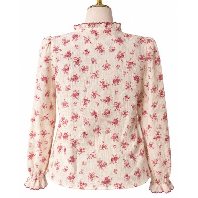 Chemise femme fleurie à manches longues et col volanté élégant